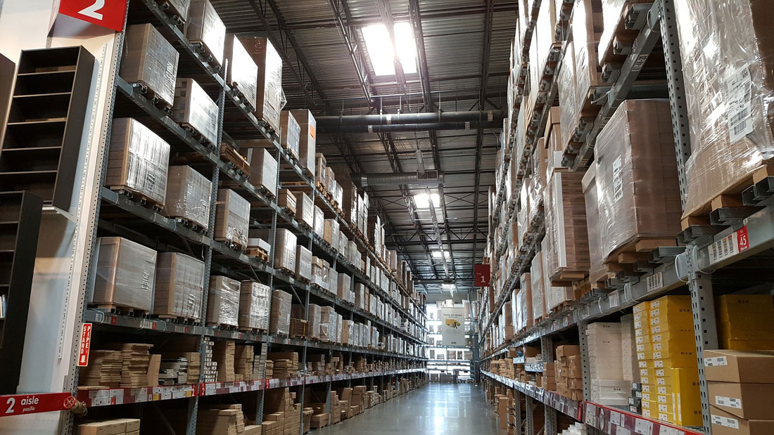 Industrial electrical work in a warehouse.